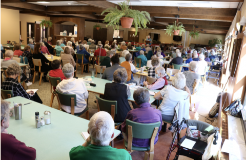 Oblates and Sisters listen to Sister Joan